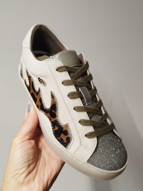 DE-PIEL-PUNTERA-BRILLO-RAYO-LEOPARDO-GAMIN.jpg